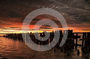 Sunset Sunrise waterfront old pier.