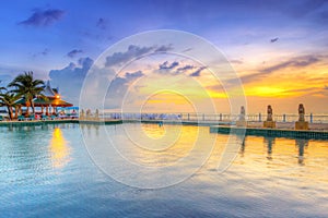 Sunset at swimming pool