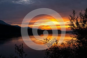 Sunset at Teslin river in Yukon territory, Canada