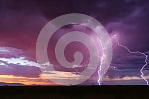Sunset thunderstorm with lightning photo