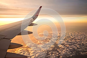 Sunset time with airplane wing from the inside, Travel in Thailand, Photo applied to tourism operators, Traveling concept