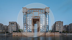 Sunset time lapse of the modern city building: Hotel de region, the Occitanie town Hall in Montpellier, France