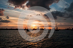 Sunset time. Looking Miami Skyline from Miami Beach