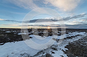 Sunset time over fields