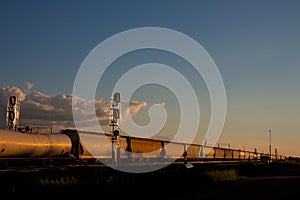 Sunset Train Passing Signal Towers