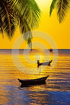Sunset tropical island sea beach, ocean sunrise landscape, palm tree, boats, ships, yellow sky, sun, blue water, summer holidays