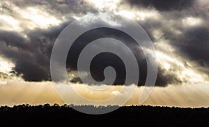 Sunset trought the clouds.