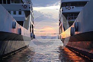 Sunset in between two ferries at Igoumenitsa, Greece.