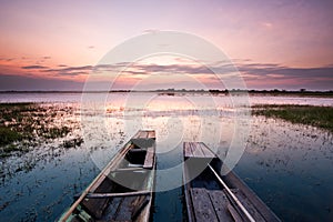 The sunset and two fishing boats