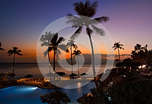 Sunset with two shells and ocean water