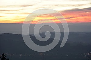 Sunset from Uetliberg, Zurich with settlements in the foreground.