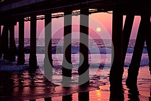 Sunset under boardwalk photo