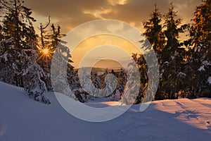 Sunset from Velka Raca mountain in Kysucke Beskydy during winter