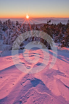 Sunset from Velka Raca mountain in Kysucke Beskydy during winter