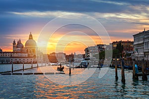 Sunset in Venice. Image of Grand Canal in Venice, with Santa Maria della Salute Basilica in the background. Venice is a popular