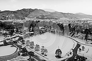 Sunset view of Aizu Wakamatsu city and castle park from aerial a