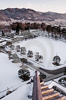 Sunset view of Aizu Wakamatsu city and castle park from aerial a