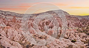 Sunset view from Aktepe Hill over Red valley in Cappadocia, Anatolia, Turkey. Goreme National Park