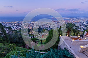 Sunset view of Bahai Shrine, gardens, downtown and port, Haifa