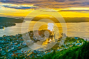 Sunset view on Bergen and harbor from the mountain floyen...IMAGE