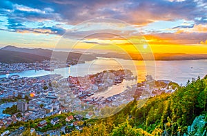 Sunset view on Bergen and harbor from the mountain floyen...IMAGE