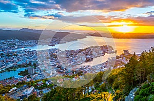 Sunset view on Bergen and harbor from the mountain floyen...IMAGE