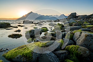 Sunset view of Black Cuillin mountains from rocky Elgol beach