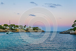 Sunset view of Cala d'or bay at Mallorca, Spain