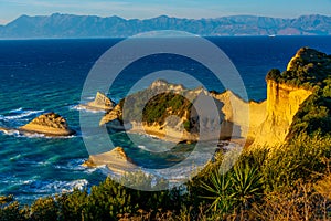 Sunset view of Cape Drastis a Corfu island, Greece