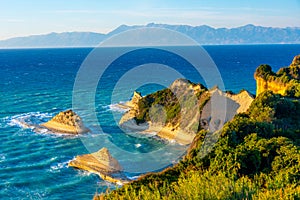 Sunset view of Cape Drastis a Corfu island, Greece