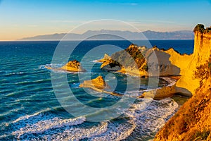 Sunset view of Cape Drastis a Corfu island, Greece