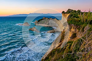 Sunset view of Cape Drastis a Corfu island, Greece