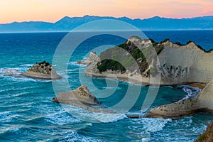 Sunset view of Cape Drastis a Corfu island, Greece