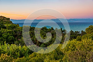 Sunset view of Cape Drastis a Corfu island, Greece