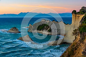 Sunset view of Cape Drastis a Corfu island, Greece