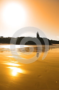 Sunset view of the castle beach and cliffs in Ballybunion