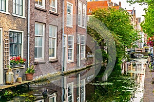 Sunset view of a channel in Delft, Netherlands