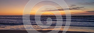 Sunset view of the Channel Islands seen from beach in Ventura California USA