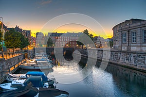 Sunset view of a channel next to the Christiansborg Slot Palace