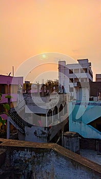 Sunset view in cityscape with bulidings