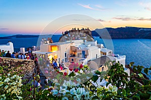 Sunset view of clifftop Castle of Oia Santorini Greece