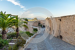 Sunset view of courtyard of castle of Santa Barbara in Alicante, Spain