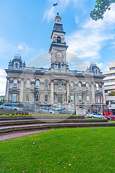 Sunset view of Dunedin town hall in New Zealand