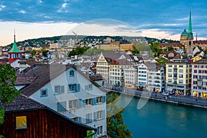 Sunset view of the east bank of the Limmat River, with the Predi