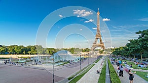 Sunset view of Eiffel Tower with fountain in Jardins du Trocadero in Paris, France.