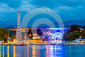 Sunset view of Ferris wheel in front of the Culture and Congress