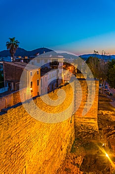 Sunset view of fortification of Alcudia town at Mallorca, Spain