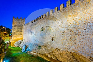 Sunset view of fortification of Alcudia town at Mallorca, Spain