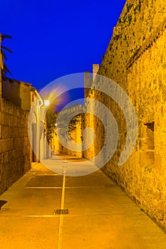 Sunset view of fortification of Alcudia town at Mallorca, Spain