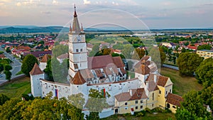 Sunset view of the Fortified Evangelical Church in Harman, Roman